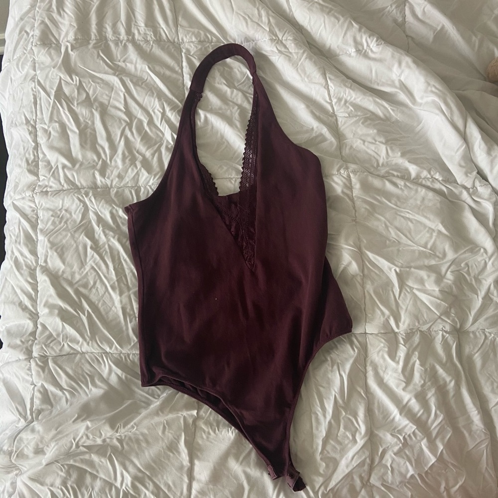 Plunging plum body suit. So cute for summer!!
